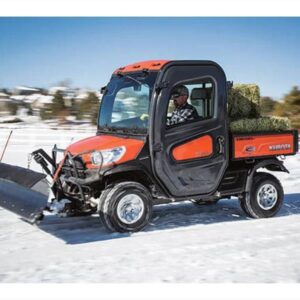 side by side kubota plowing snow